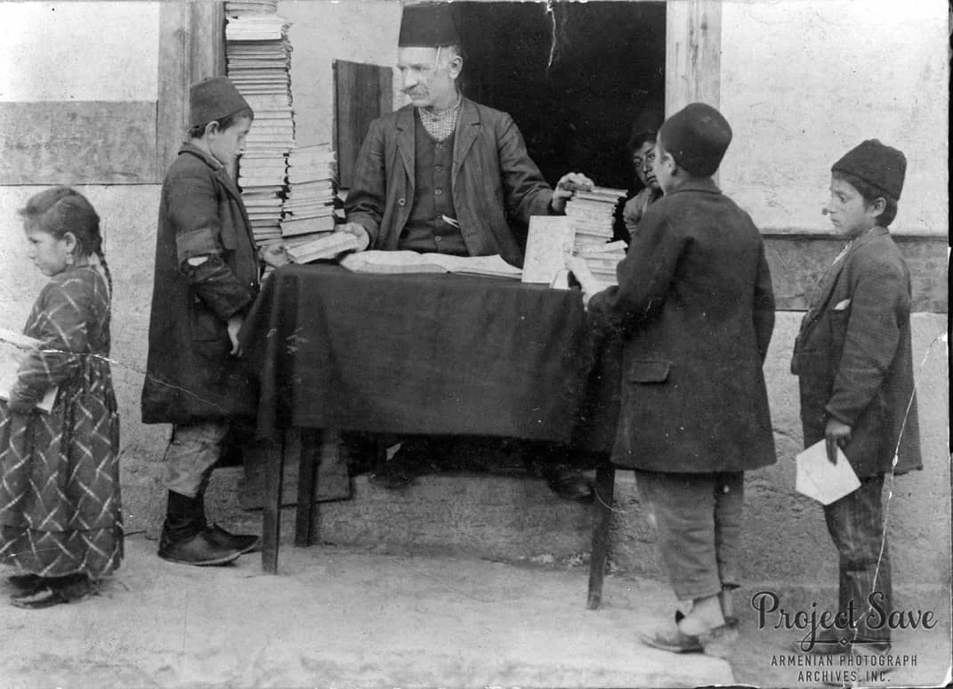 Giving Out Books at the Aramian School in Sebastia